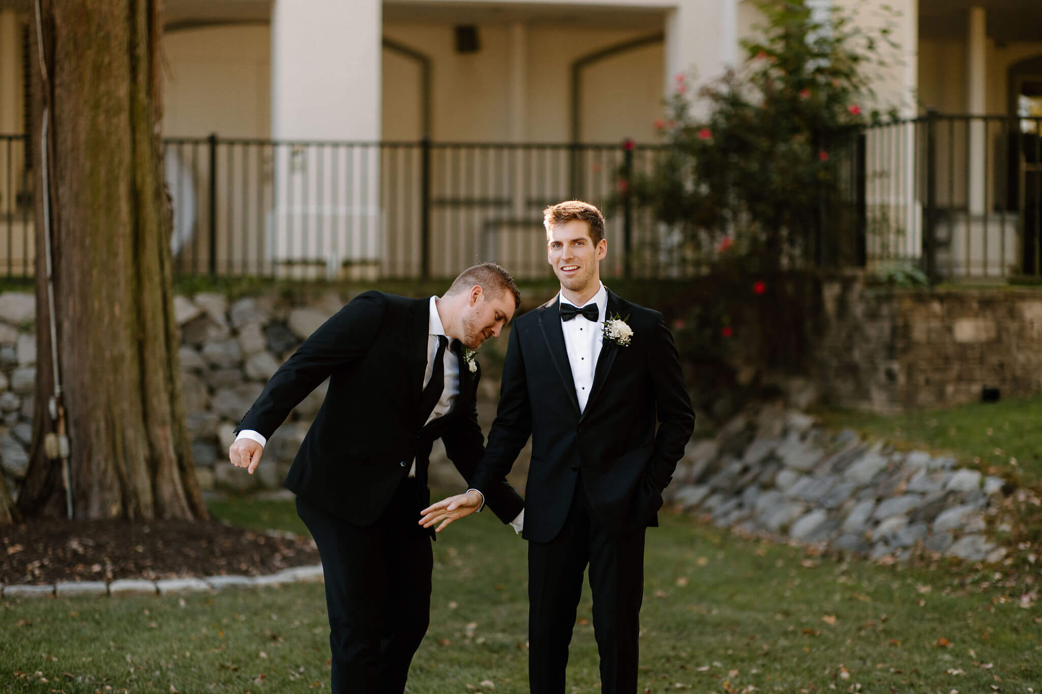 groom's brother slapping the groom's rear end
